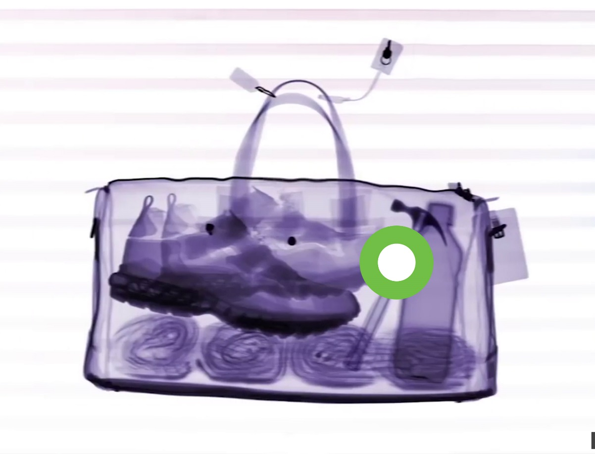 Another example is where the ‘looking point’ of a baggage scanner operator is superimposed on a baggage scanner image.